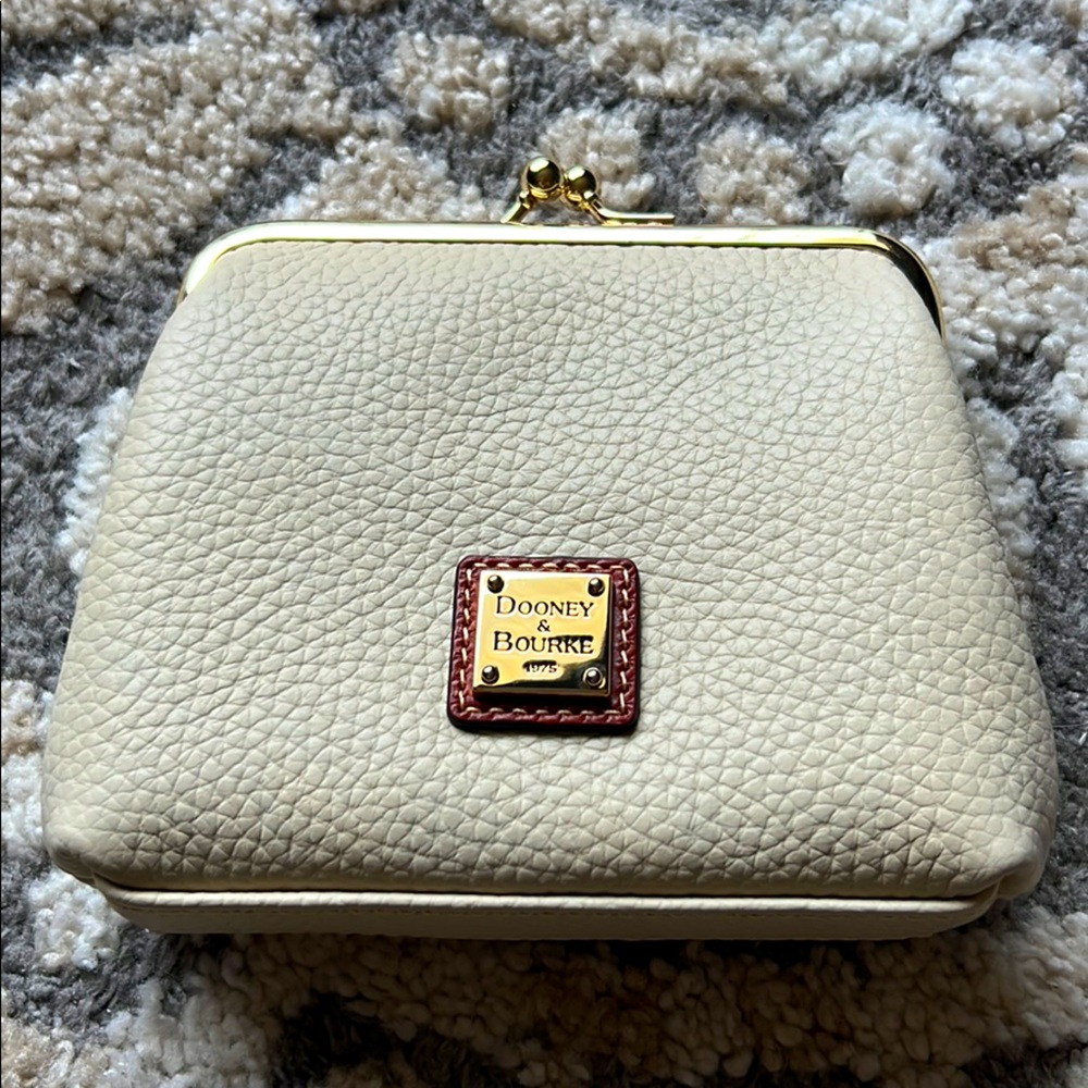 Dooney & Bourke large framed purse in bone color